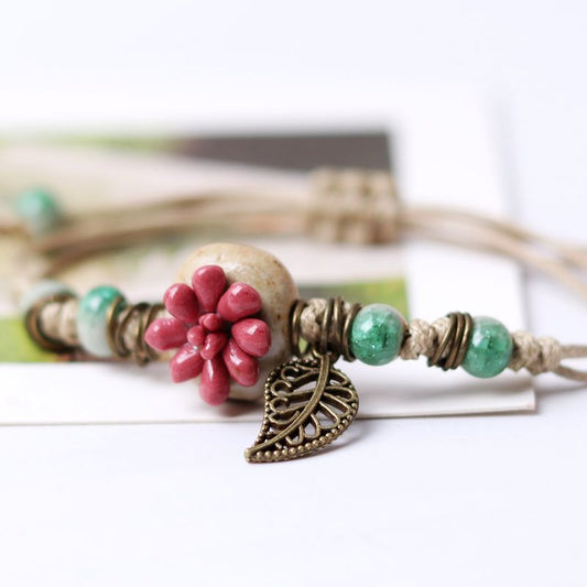 Small fresh pastoral style hand pinched four-leaf clover succulent Bracelet female summer trend female color clay bracelet beads five-color succulent flower