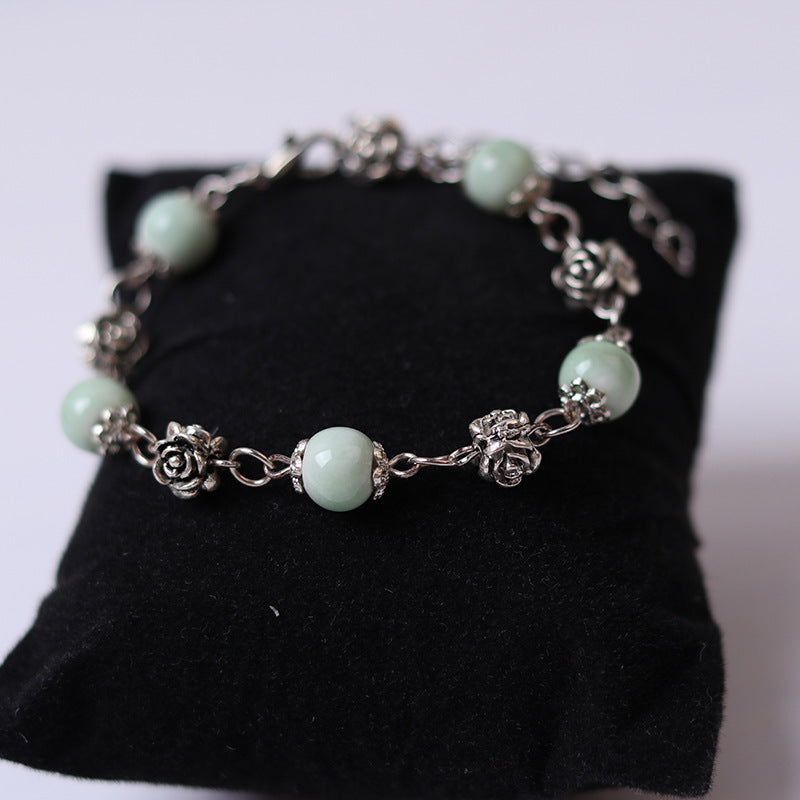 Fashionable and simple bohemian porcelain bead bracelet, alloy rose collocation, exquisitely hand-woven