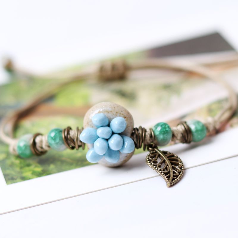 Small fresh pastoral style hand pinched four-leaf clover succulent Bracelet female summer trend female color clay bracelet beads five-color succulent flower